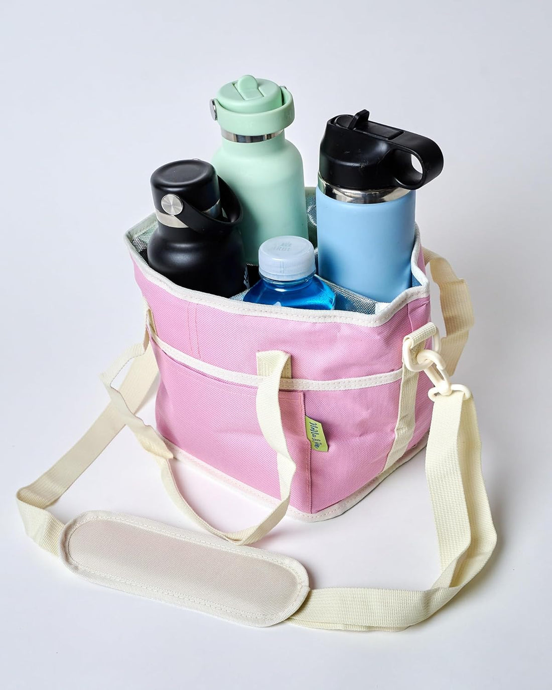 4 Water Bottle Holder with Strap in use as a crossbody carrier for multiple bottles